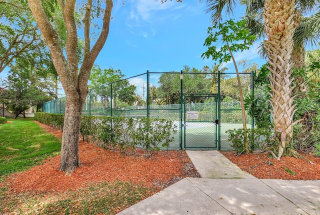 7271 Briella Dr, Boynton Beach, FL 33437 - view of tennis court with a gate