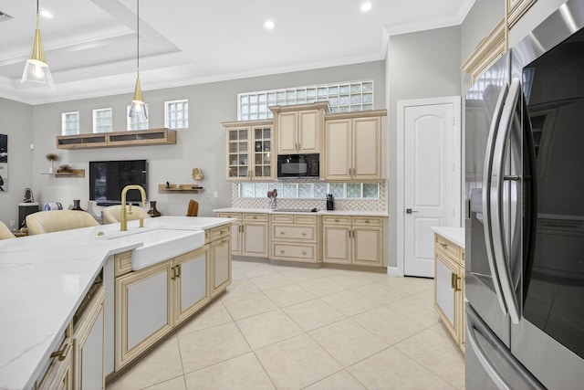 8168 Valhalla Dr, Delray Beach, FL 33446 - kitchen featuring black appliances, backsplash, ornamental molding, decorative light fixtures, and cream cabinets