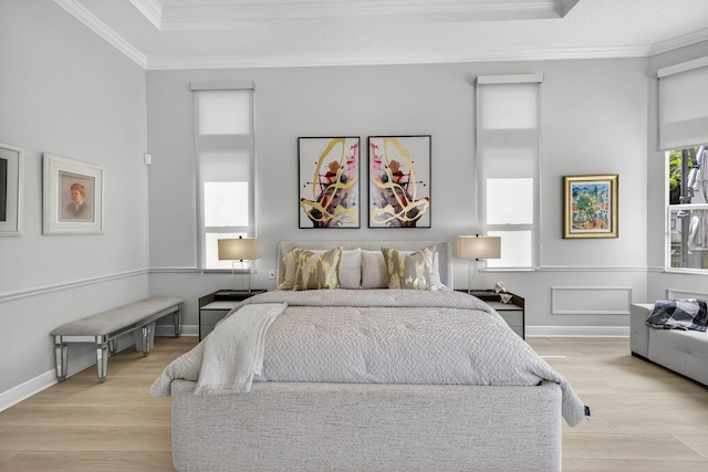 8168 Valhalla Dr, Delray Beach, FL 33446 - bedroom featuring ornamental molding, light wood-type flooring, and a raised ceiling