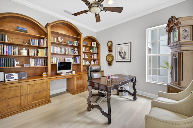 8168 Valhalla Dr, Delray Beach, FL 33446 - office area featuring ceiling fan, light wood finished floors, crown molding, and built in study area
