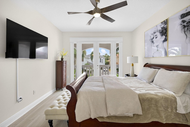 8168 Valhalla Dr, Delray Beach, FL 33446 - bedroom featuring french doors, access to outside, wood finished floors, and a ceiling fan