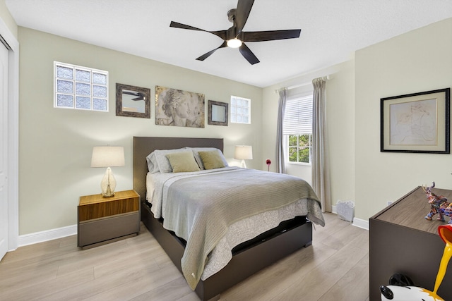 8168 Valhalla Dr, Delray Beach, FL 33446 - bedroom with light wood-style floors and a ceiling fan