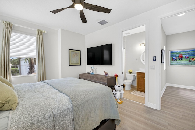 8168 Valhalla Dr, Delray Beach, FL 33446 - bedroom featuring light wood-style floors, a ceiling fan, and ensuite bath