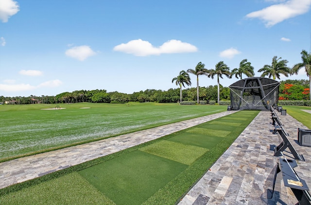 8168 Valhalla Dr, Delray Beach, FL 33446 - view of grassy yard with golf course view, view of wooded area, and a game area
