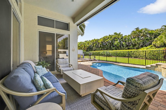 8168 Valhalla Dr, Delray Beach, FL 33446 - view of swimming pool featuring outdoor lounge area, a fenced backyard, and a patio