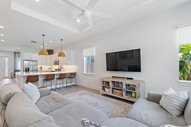 17742 Evangeline Ave, Jupiter, FL 33458 - living area featuring light wood-type flooring, recessed lighting, and a ceiling fan