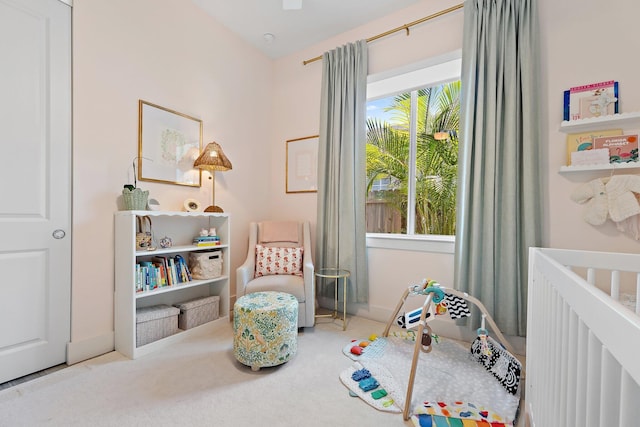 17742 Evangeline Ave, Jupiter, FL 33458 - carpeted bedroom with a nursery area