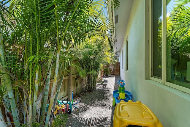 17742 Evangeline Ave, Jupiter, FL 33458 - view of property exterior with a fenced backyard and stucco siding