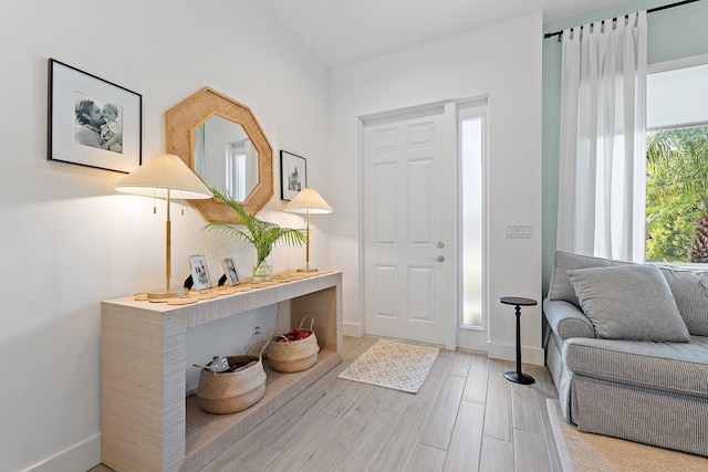 17742 Evangeline Ave, Jupiter, FL 33458 - entryway with wood finished floors and baseboards