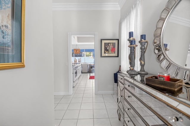 2002 Valencia Dr, Delray Beach, FL 33445 - hall featuring crown molding and light tile patterned floors