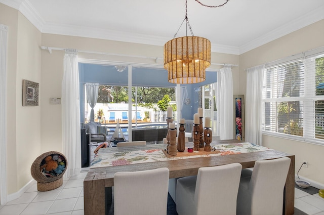 2002 Valencia Dr, Delray Beach, FL 33445 - dining space featuring tile patterned floors and crown molding