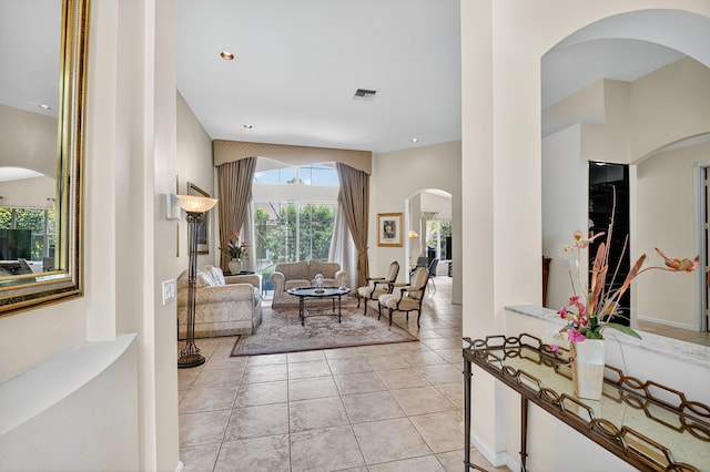 11291 Barca Blvd, Boynton Beach, FL 33437 - living area with arched walkways, light tile patterned flooring, and recessed lighting