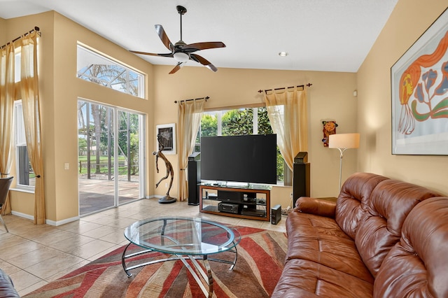 11291 Barca Blvd, Boynton Beach, FL 33437 - living room featuring a ceiling fan, plenty of natural light, light tile patterned floors, and lofted ceiling