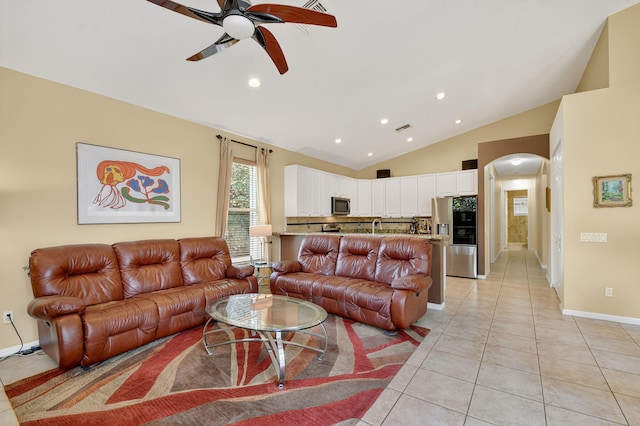 11291 Barca Blvd, Boynton Beach, FL 33437 - living area featuring lofted ceiling, ceiling fan, arched walkways, recessed lighting, and light tile patterned floors