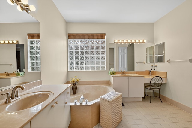 11291 Barca Blvd, Boynton Beach, FL 33437 - full bath with a garden tub, two vanities, and tile patterned floors