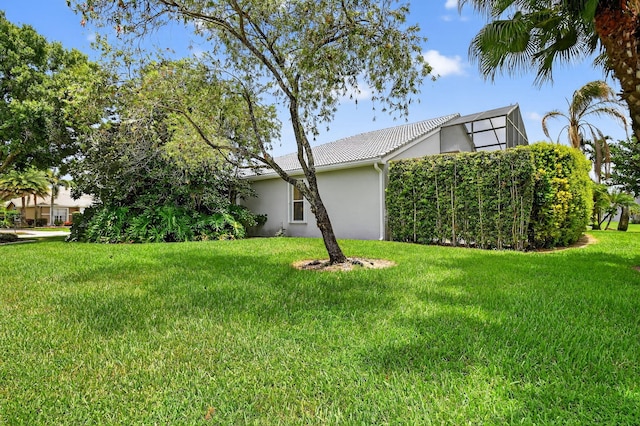 11291 Barca Blvd, Boynton Beach, FL 33437 - view of side of home with stucco siding and a lawn