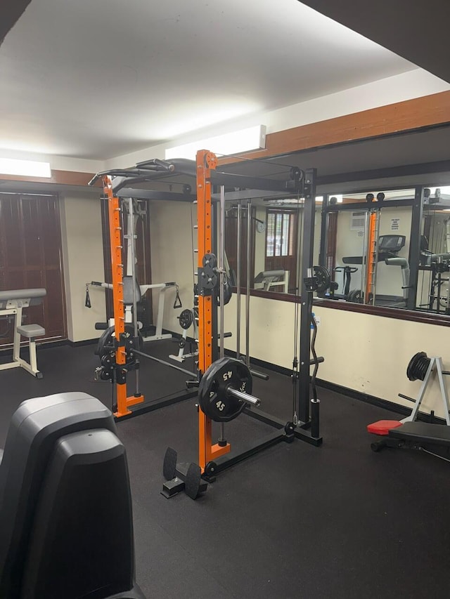 671 NE 195th St Unit 316E, Miami, FL 33179 - exercise area featuring baseboards