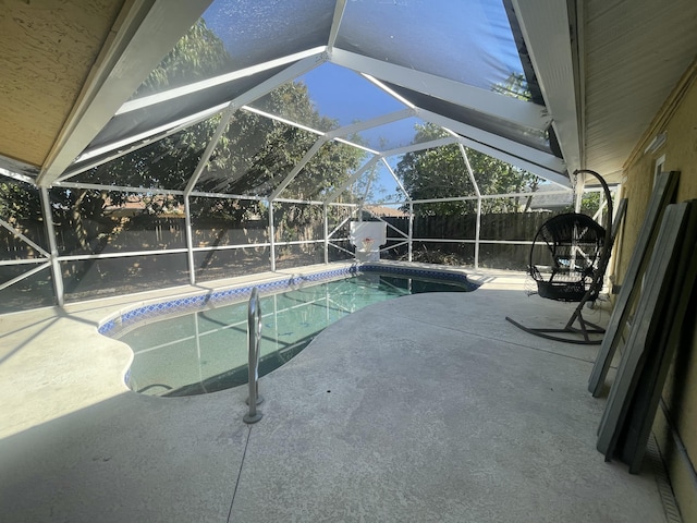 1186 Camprock Rd, West Palm Beach, FL 33417 - view of swimming pool with a fenced backyard, a patio, and a lanai