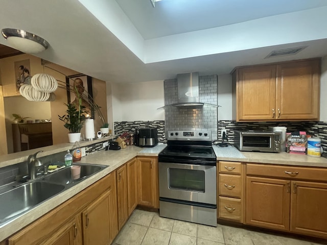 1186 Camprock Rd, West Palm Beach, FL 33417 - kitchen with electric stove, wall chimney exhaust hood, decorative backsplash, and light countertops