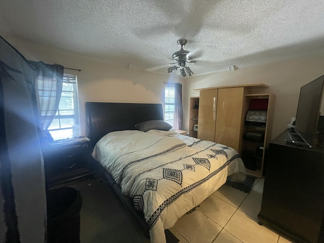 1186 Camprock Rd, West Palm Beach, FL 33417 - bedroom with a textured ceiling, light tile patterned floors, ceiling fan, and a closet