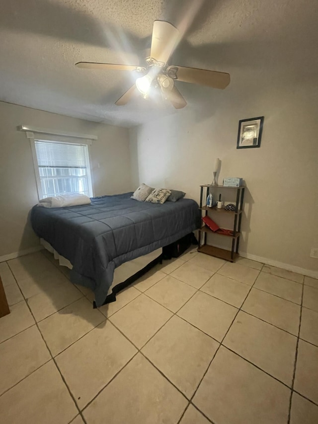 1186 Camprock Rd, West Palm Beach, FL 33417 - bedroom featuring a textured ceiling, light tile patterned flooring, and ceiling fan