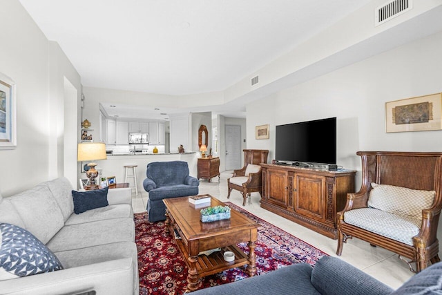 12480 Crystal Pointe Dr Unit 102, Boynton Beach, FL 33437 - living room featuring light tile patterned floors