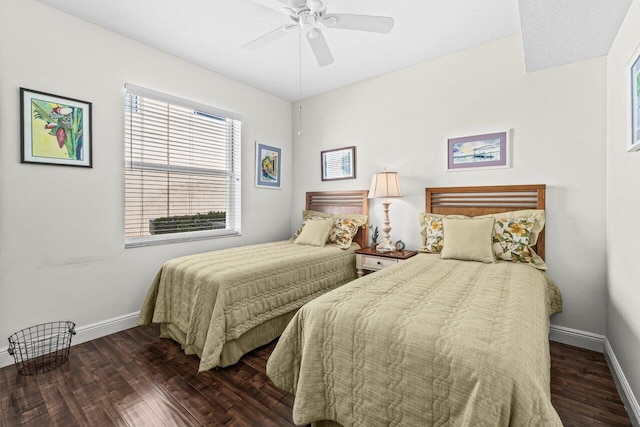 12480 Crystal Pointe Dr Unit 102, Boynton Beach, FL 33437 - bedroom with dark wood-style floors and ceiling fan