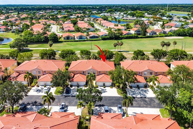 12480 Crystal Pointe Dr Unit 102, Boynton Beach, FL 33437 - aerial perspective of suburban area with a golf course and a nearby body of water