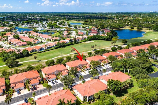 12480 Crystal Pointe Dr Unit 102, Boynton Beach, FL 33437 - aerial perspective of suburban area featuring a large body of water and a golf club