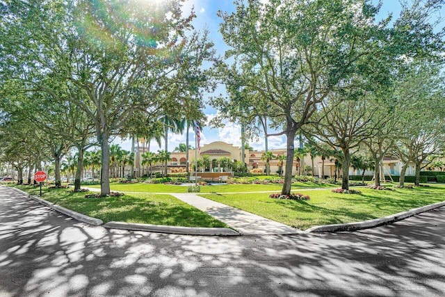 12480 Crystal Pointe Dr Unit 102, Boynton Beach, FL 33437 - view of community with a lawn