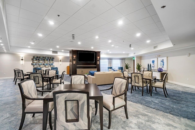 12480 Crystal Pointe Dr Unit 102, Boynton Beach, FL 33437 - dining space featuring a tray ceiling, recessed lighting, and carpet flooring