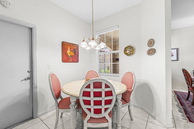 12480 Crystal Pointe Dr Unit 102, Boynton Beach, FL 33437 - dining room featuring a chandelier and light marble finish floors