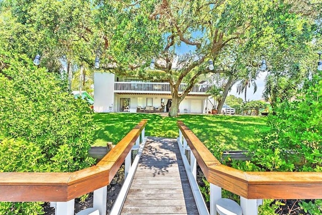 2438 Inland Cove Rd, Palm Beach Gardens, FL 33410 - back of property featuring a yard