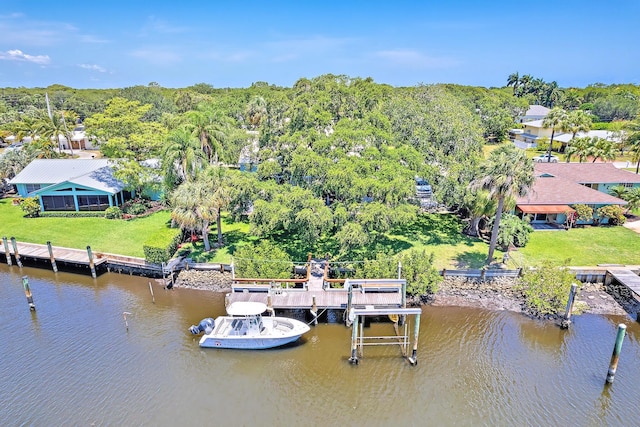 2438 Inland Cove Rd, Palm Beach Gardens, FL 33410 - dock featuring a water view, a lawn, and a forest view