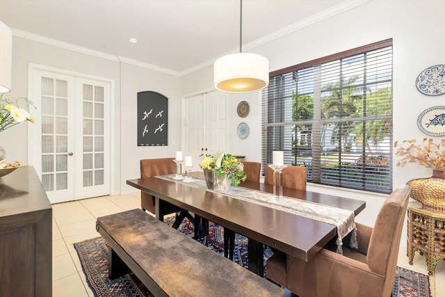 63 Lake Eden Dr, Boynton Beach, FL 33435 - dining space with crown molding, light tile patterned floors, and french doors