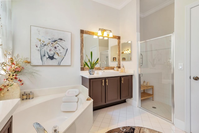 63 Lake Eden Dr, Boynton Beach, FL 33435 - bathroom featuring a shower stall, vanity, a garden tub, ornamental molding, and tile patterned flooring