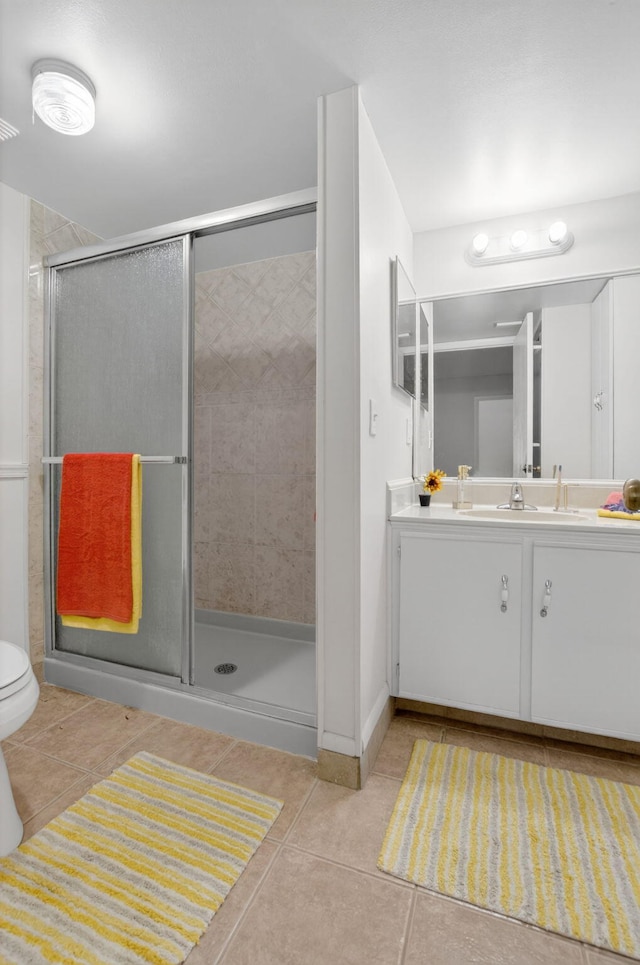 9521 Boca Cove Cir Unit 508, Boca Raton, FL 33428 - bathroom with vanity, tile patterned floors, and a shower stall