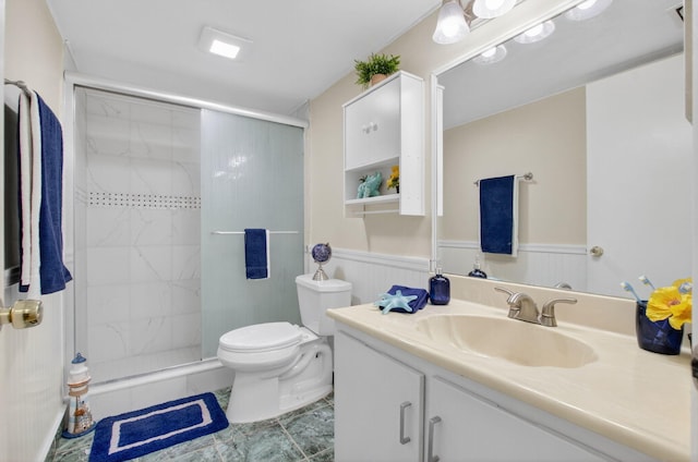 9521 Boca Cove Cir Unit 508, Boca Raton, FL 33428 - bathroom with vanity, a shower stall, and a wainscoted wall