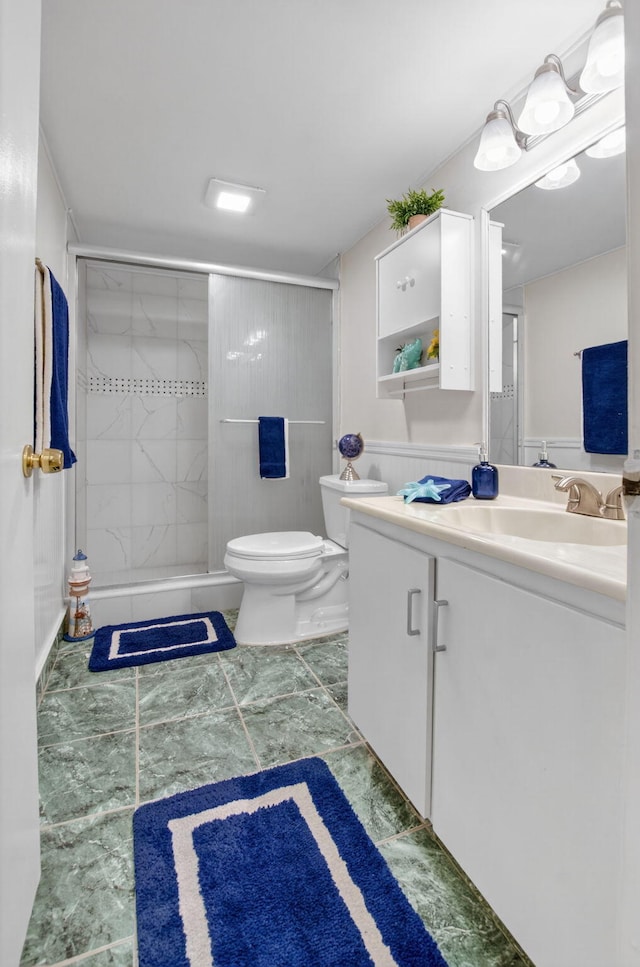 9521 Boca Cove Cir Unit 508, Boca Raton, FL 33428 - bathroom featuring vanity, a shower stall, and marble look tiles