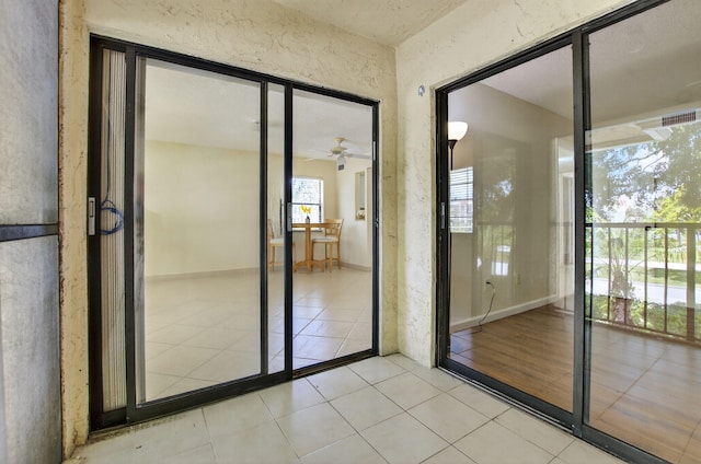 9521 Boca Cove Cir Unit 508, Boca Raton, FL 33428 - entryway with tile patterned floors and ceiling fan