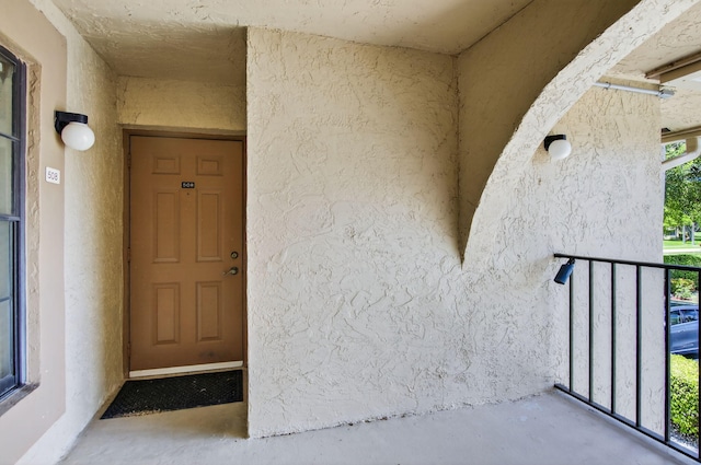 9521 Boca Cove Cir Unit 508, Boca Raton, FL 33428 - view of exterior entry featuring stucco siding