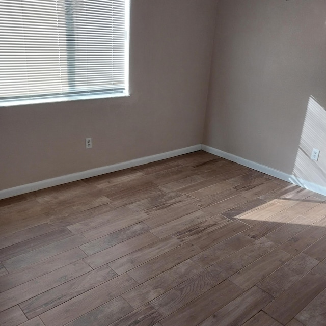 2482 SE Floresta Dr, Port Saint Lucie, FL 34984 - spare room with wood finished floors and baseboards