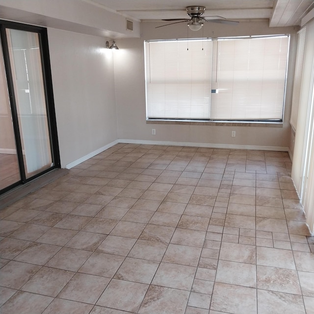 2482 SE Floresta Dr, Port Saint Lucie, FL 34984 - empty room with ceiling fan and light tile patterned floors