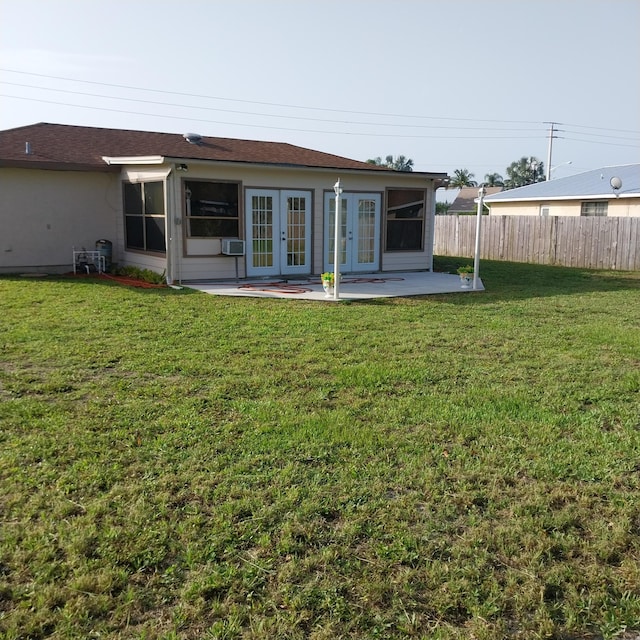 2482 SE Floresta Dr, Port Saint Lucie, FL 34984 - rear view of property featuring french doors and a patio area