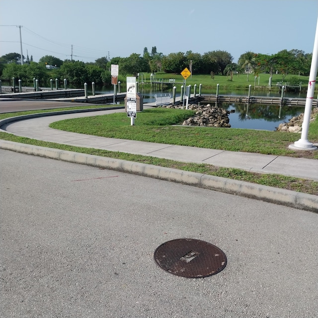 2482 SE Floresta Dr, Port Saint Lucie, FL 34984 - view of community featuring a water view