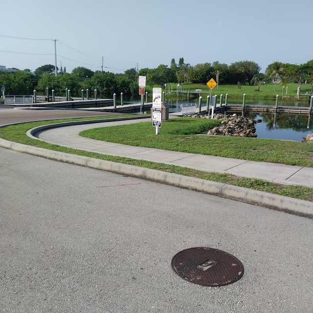 2482 SE Floresta Dr, Port Saint Lucie, FL 34984 - view of community featuring a water view