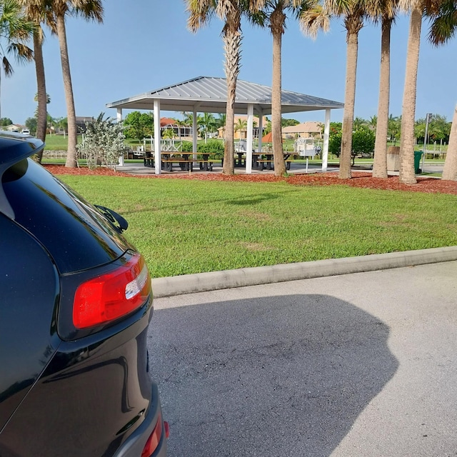 2482 SE Floresta Dr, Port Saint Lucie, FL 34984 - view of grassy yard featuring a gazebo