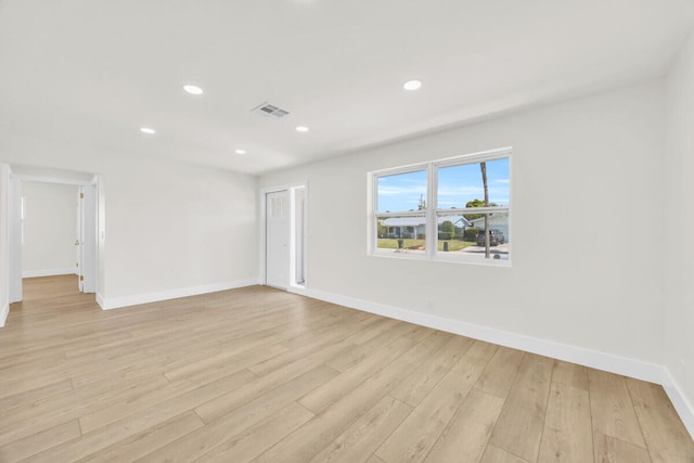 400 Riverside Dr, Palm Beach Gardens, FL 33410 - spare room featuring light wood finished floors and recessed lighting