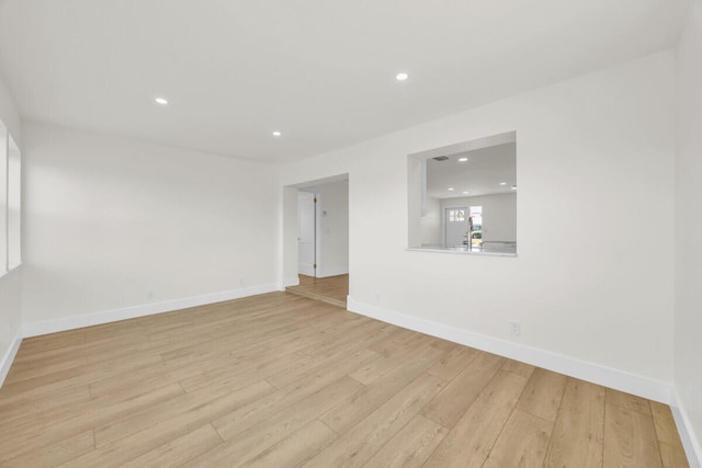 400 Riverside Dr, Palm Beach Gardens, FL 33410 - empty room with light wood-type flooring and recessed lighting