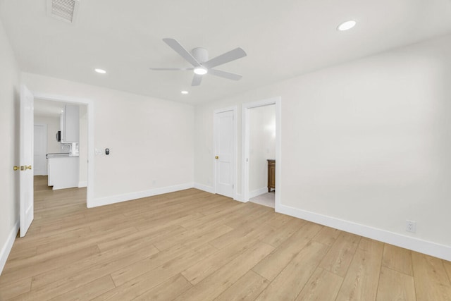 400 Riverside Dr, Palm Beach Gardens, FL 33410 - spare room with a ceiling fan, light wood-type flooring, and recessed lighting